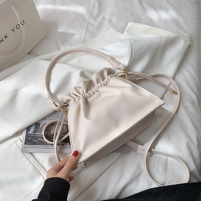 Γυναικεία τσάντα από έκο δέρμα  και κλείσιμο με κορδόνια