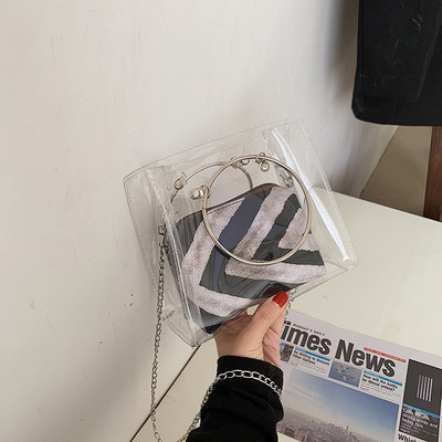 Sieviešu caurspīdīga soma ar garu un īsu rokturi