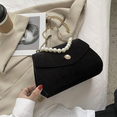 Μοντέρνη γυναικεία τσάντα σουέτ με πέρλες και κοντή λαβή