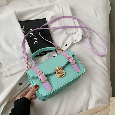 Γυναικεία μοντέρνα οικολογική δερμάτινη τσάντα με αγκράφες