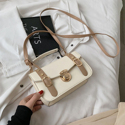 Γυναικεία μοντέρνα οικολογική δερμάτινη τσάντα με αγκράφες