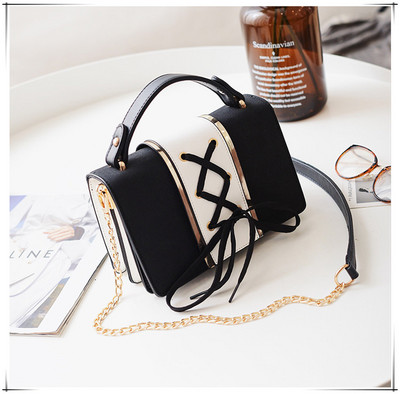 Γυναικεία μικρή τσάντα με κορδόνια και μακριά μεταλλική λαβή