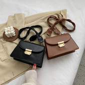 Geanta de dama moderna din piele cu maner