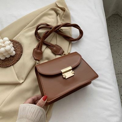 Geanta de dama moderna din piele cu maner