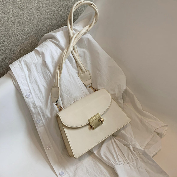 Geanta de dama moderna din piele cu maner