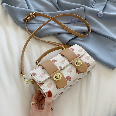 Γυναικεία τσάντα με μεταλλική στερέωση - με κοντή και μακριά λαβή