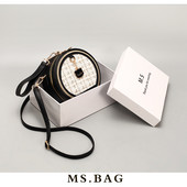 Moderna soma no eko ādas un apaļa tekstila