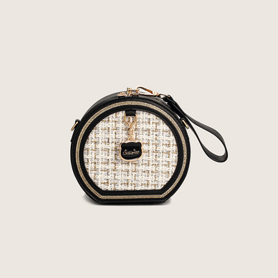 Moderna soma no eko ādas un apaļa tekstila