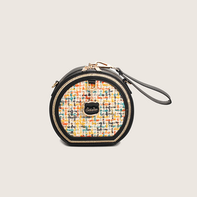 Moderna soma no eko ādas un apaļa tekstila