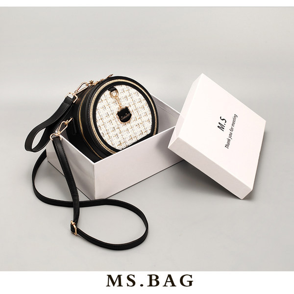 Moderna soma no eko ādas un apaļa tekstila