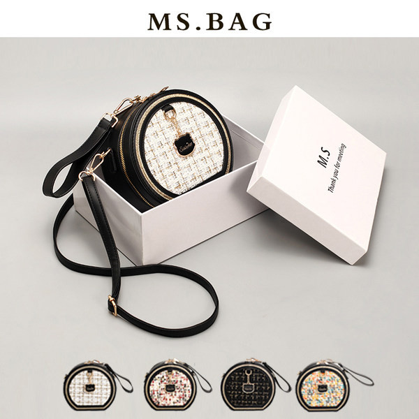 Moderna soma no eko ādas un apaļa tekstila