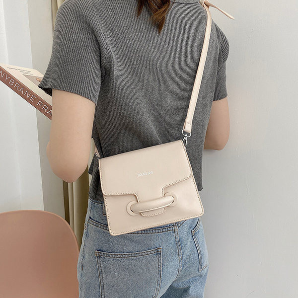 Γυναικεία τσάντα με επιγραφή σε τέσσερα χρώματα οικολογικό δέρμα