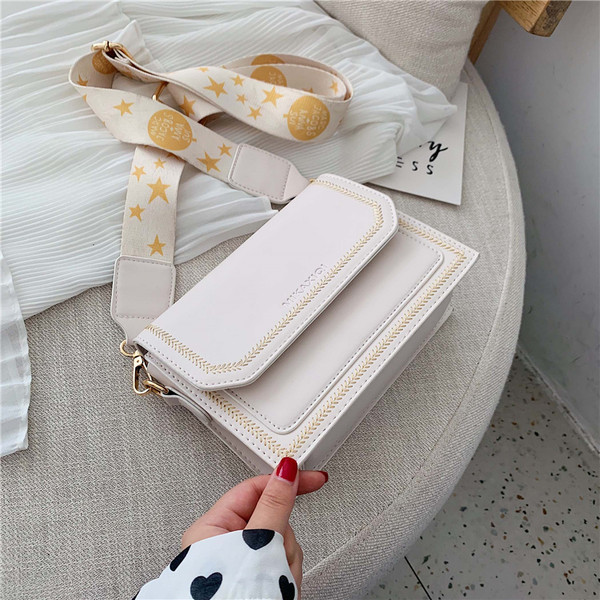 Μικρή έκο δερμάτινη τσάντα με υφασμάτινη λαβή