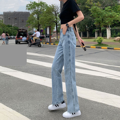 Blugi de dama cu talie inalta si crapaturi pe picioare