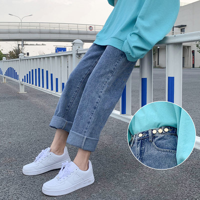 Γυναικεία τζιν με φαρδύ μοντέλο και ψηλή μέση με μεταλλικά στοιχεία