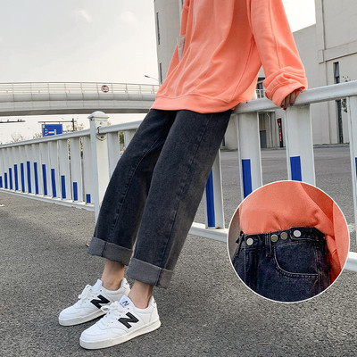 Γυναικεία τζιν με φαρδύ μοντέλο και ψηλή μέση με μεταλλικά στοιχεία