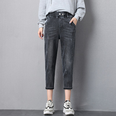 Mūsdienīgi džinsi ar augstu elastīgu jostasvietu un 7/8 garumu