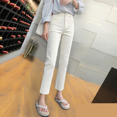 Sieviešu pieguloši džinsi ar saplēstiem motīviem