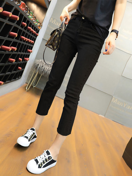 Sieviešu pieguloši džinsi ar saplēstiem motīviem