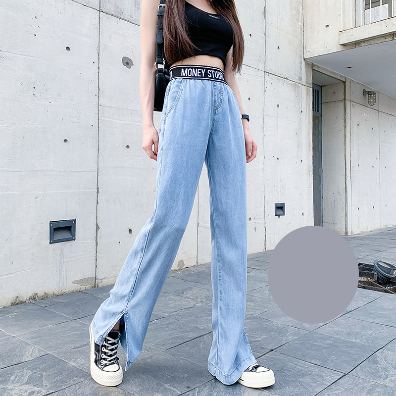 Model larg de blugi cu fante si talie elastica