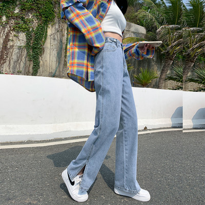 Vasarīgi plati džinsi ar šķēlumiem un augstu vidukli