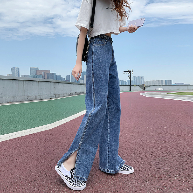 Vasarīgi plati džinsi ar šķēlumiem un augstu vidukli