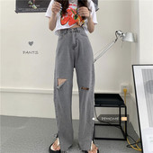 Sieviešu džinsi ar saplēstu motīvu un augstu vidukli pelēkā krāsā