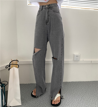 Sieviešu džinsi ar saplēstu motīvu un augstu vidukli pelēkā krāsā