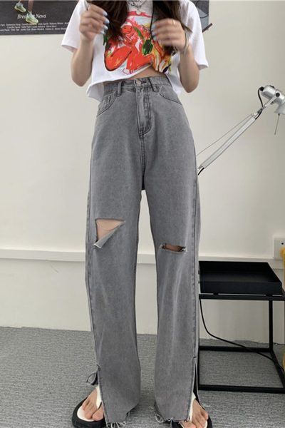 Sieviešu džinsi ar saplēstu motīvu un augstu vidukli pelēkā krāsā