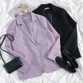 Geaca de dama actuala cu nasturi si decolteu spitz