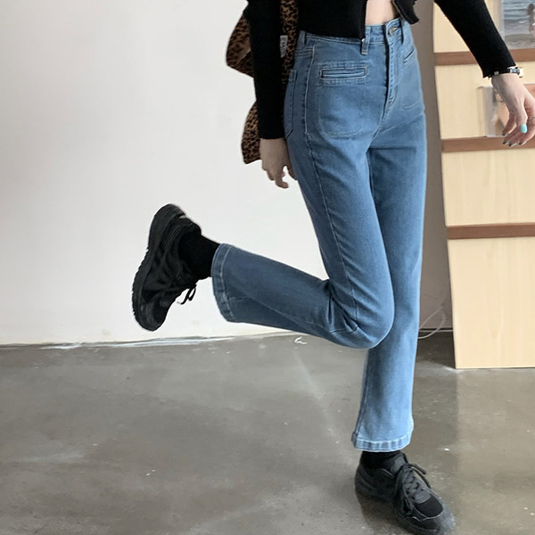 Sieviešu džinsu vienkrāsains modelis zilā krāsā - ar augstu vidukli