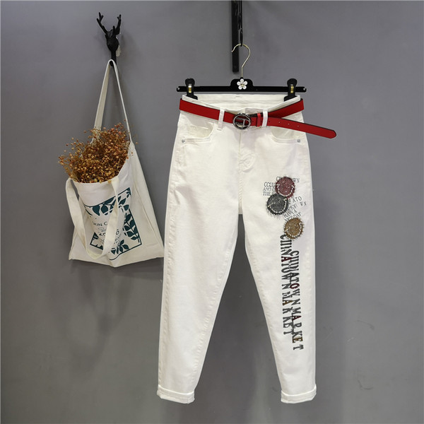 Jauns sieviešu džinsu modelis ar akmentiņiem un aplikācijām - baltā krāsā