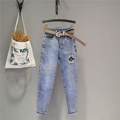 Ikdienas sieviešu džinsi ar izšuvumu - zilā krāsā