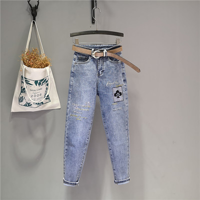 Ikdienas sieviešu džinsi ar izšuvumu - zilā krāsā