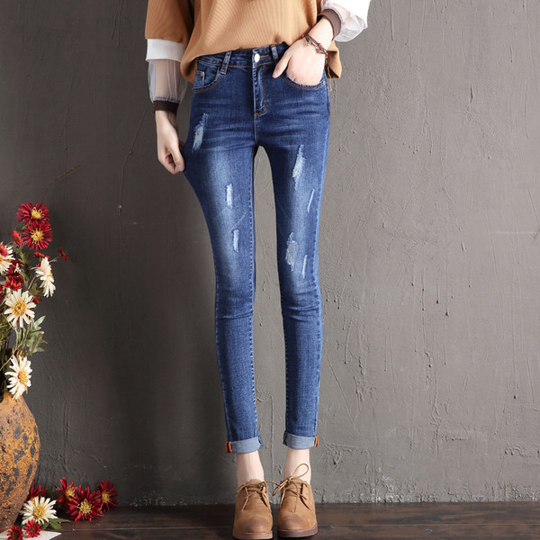 Blugi elastici de dama cu motive rupte