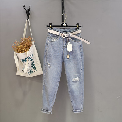 Blugi moderni de dama cu talie inalta si motive rupte in albastru