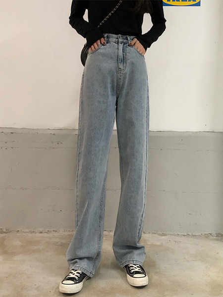 Model nou de blugi cu picioare late și legături în talie