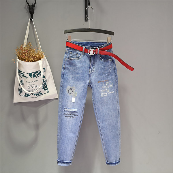 Jauns sieviešu džinsu modelis ar augstu vidukli un akmeņiem zilā krāsā