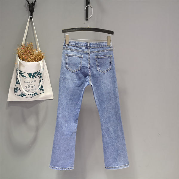 Blugi moderni de dama cu crapaturi in albastru