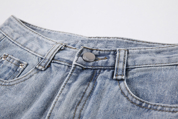 Blugi de dama - model asimetric cu talie inalta