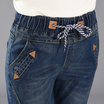 Blugi de dama cu talie inalta si sireturi