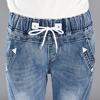 Blugi de dama cu talie inalta si sireturi