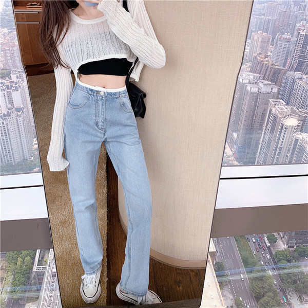 Vienkāršs sieviešu džinsu modelis ar kabatu zilā krāsā