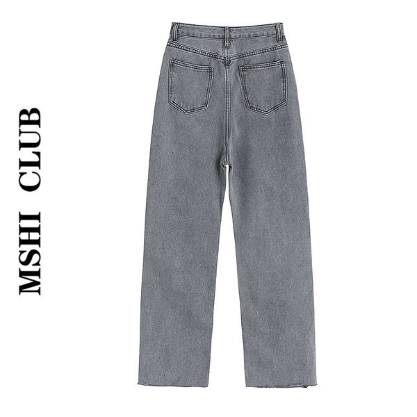 Sieviešu moderni džinsi ar šķēlumiem un saplēstu rakstu