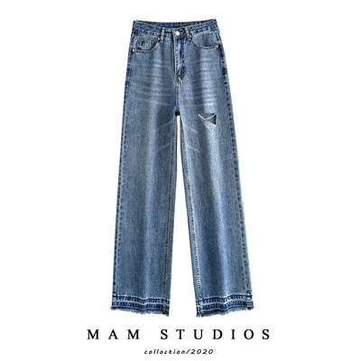 Sieviešu džinsi ar saplēstu motīvu un augstu vidukli - divi modeļi