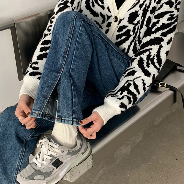 Sieviešu džinsi ar augstu vidukli un šķēlumiem