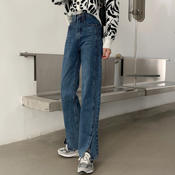 Sieviešu džinsi ar augstu vidukli un šķēlumiem