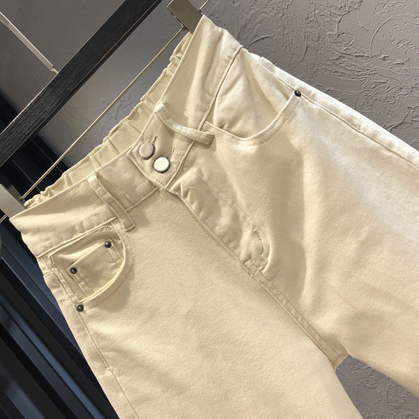 Sieviešu džinsu plats modelis ar augstu vidukli un kabatām