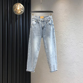 Sieviešu moderni džinsi ar augstu vidukli - zilā krāsā