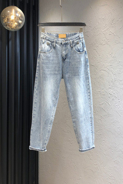 Sieviešu moderni džinsi ar augstu vidukli - zilā krāsā